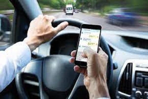 Using a mobile phone while driving is playing with the lives of passers-by